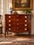 A handsome mid-19th century Sheraton cookie-corner four drawer chest in mahogany, showing the lingering classical...