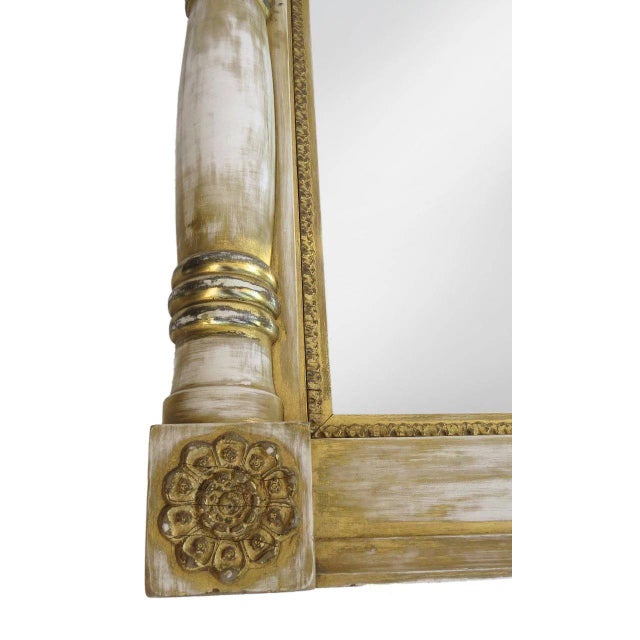 Large American traces of gilt over mantel mirror with corner rosettes and side columns. C.1860 60" by 28"