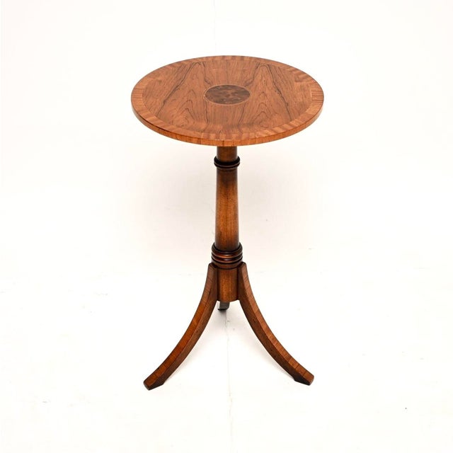 A beautiful antique Georgian style inlaid wine table in various woods. This was made in England, it dates from around the...