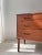 Beautiful Danish design chest of drawers from the 1960s, crafted from high-quality teak veneer and featuring subtle...