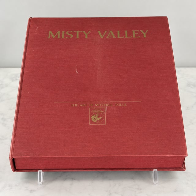 DESCRIPTION A beautifully preserved limited-edition art portfolio, Misty Valley, by American wildlife artist Mitchell D....