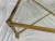 A breathtaking brass coffee table crafted by the esteemed Italian maker, Solmet. This exquisite piece showcases a sleek...