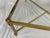 A breathtaking brass coffee table crafted by the esteemed Italian maker, Solmet. This exquisite piece showcases a sleek...