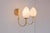 A pair of elegant wall lamps produced by Markslöjd, Sweden, circa 1980s. The lamps feature a refined and timeless design,...