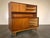 Beautiful Danish mid-century cabinet in teak, produced in Denmark in the 1960s. The piece features a classic two-part...