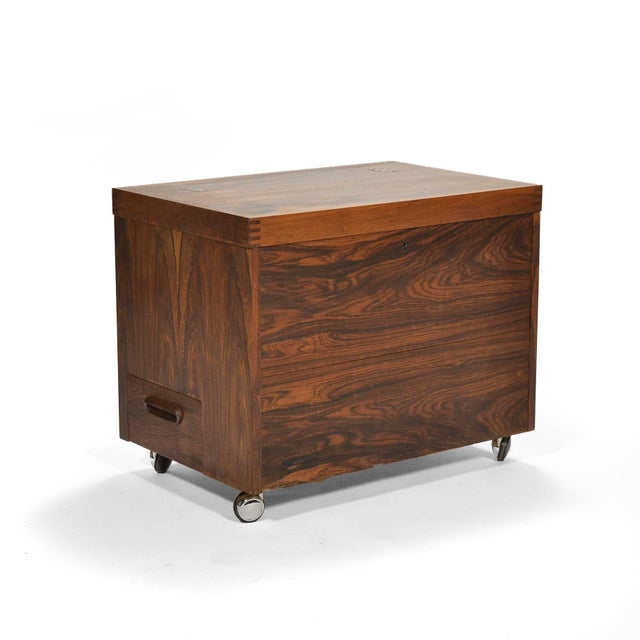 This delightful piece designed by Rolf Hesland and crafted by Haug Snekkeri for Bruksbo serves double duty as both a side...