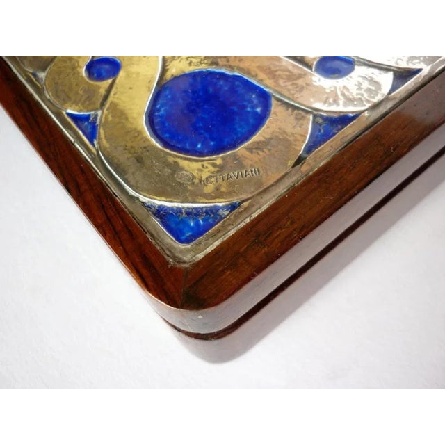 Ashtray Ottaviani Italy, 1970 Silver thrown with blue enamel Wooden box This piece has an attribution mark, I am sure that...