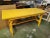 Unique yellow painted heavy duty work bench made from large beams. Hand crafted in the 70's and in good condition. Great...