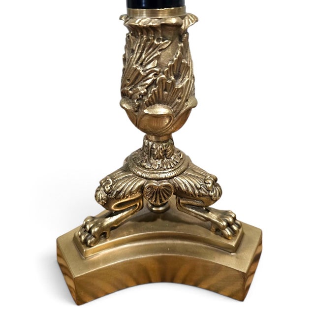 An exceptional pair of vintage 1980s Neoclassical three-light candelabras by Decorative Crafts Inc., beautifully crafted...
