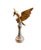 Add a playful touch to your space with this unique European hand-carved wood bird sculpture. Standing majestically on a...