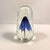 Artisan-made, hand-blown, art glass paperweight by Rochester Folk Art Guild features a graceful, cobalt blue form...