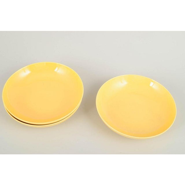 Aluminia “Susanne” Confetti series, mid-20th century. Set of three large deep faience plates from Aluminia, model...