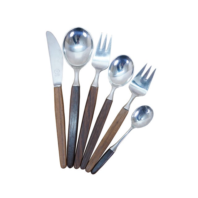 Mid to late 20th century Dansk Designs wood handled flatware / serving utensils designed by Tias Eckhoff and including...