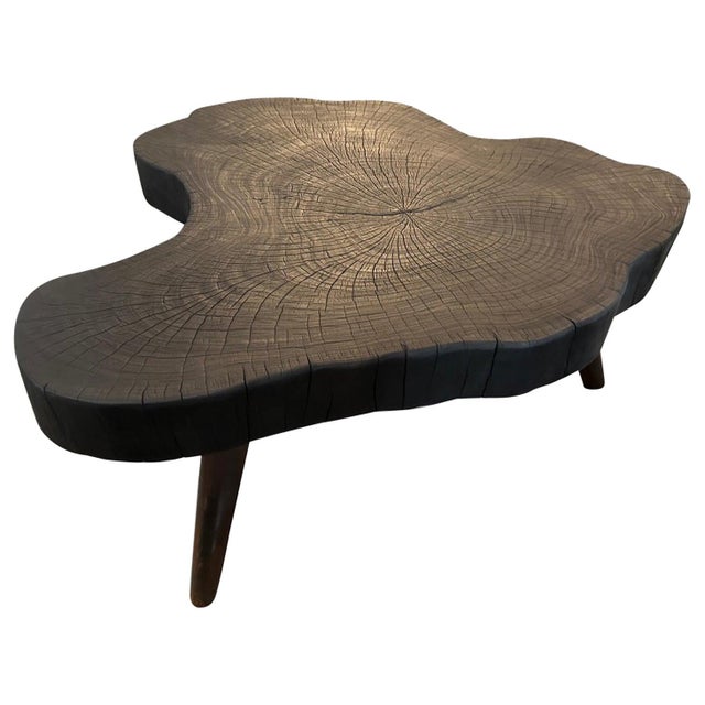 Impressive four inch thick slab coffee table, charred sanded and sealed revealing the beautiful wood grain. Set on mid...