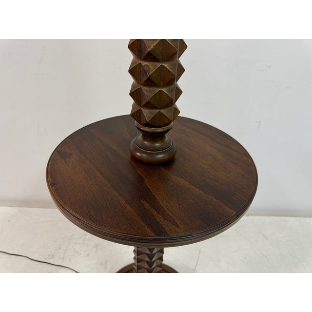 Carved oak floor lamp This image depicts a French carved oak floor lamp in the style of Charles Dudouyt. The lamp has a...