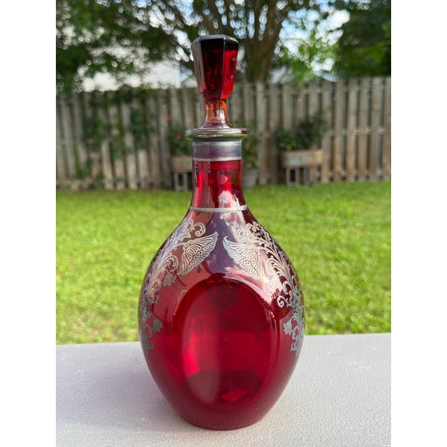 Offering for sale this exquisite Bohemian ruby red wine or liquor decanter with the following fine features: - Hand-blown...