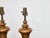 A pair of turned pine table lamps from England, Midcentury, professionally rewired for the USA. Made of solid pine with a...