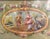 Delicately rendered in a soft Rococo palette, this antique Aubusson gouache presents a charming pastoral fête galante....