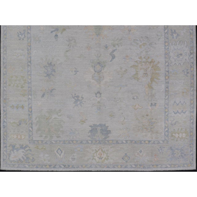 Modern Tribal Oushak With a Cream Border and Light Gray-Blue Background For Sale - Image 10 of 13