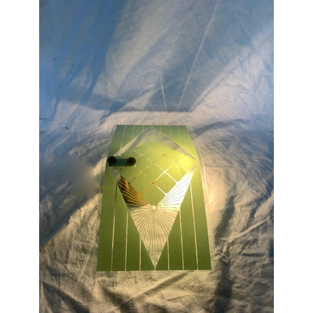 Pair of simple and elegant 1950s lamps. Printed and engraved glass. Brass structure, original 1950s with E14 lamp holder....