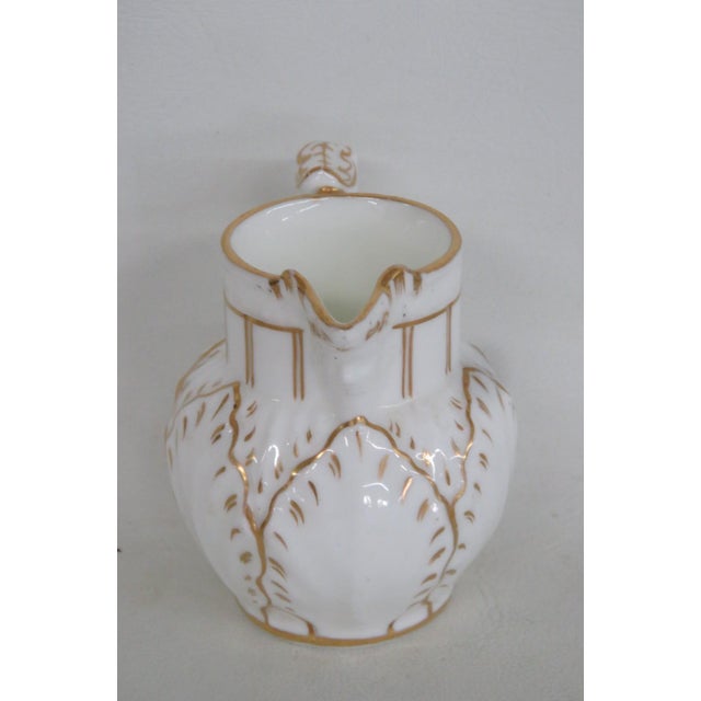 This adorably Small Creamer Jug is made of porcelain / ceramic. This darling little creamer has excellent vintage style...