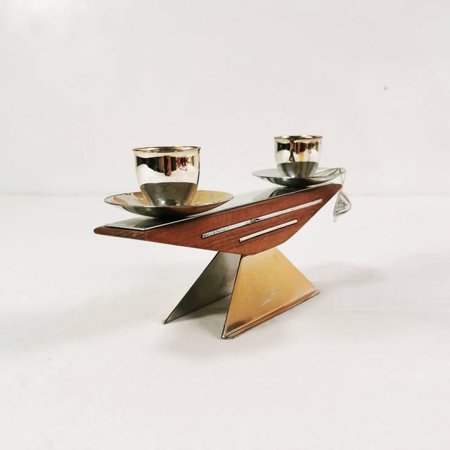 Jrus candlestick, German origin, 1950s. Made of mixed materials (wood and metal); two-armed design. Condition: good to...