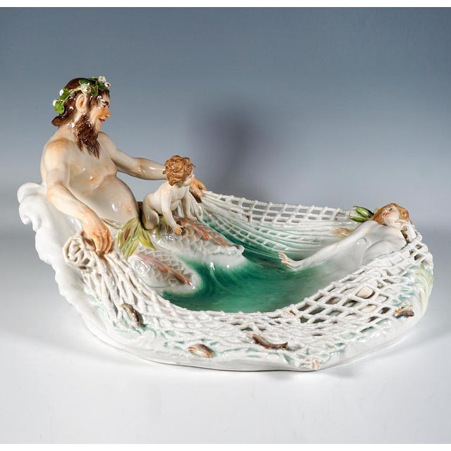 Exquisite large and rare meissen art nouveau porcelain group: triton adorned with water lily wreath on his head, half man,...