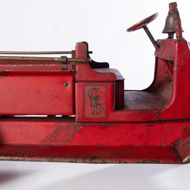 Wonderfully and solidly made. While it has lost some of its original paint, this item is made of a thick metal and is not...