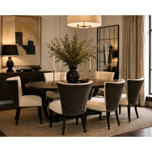 Striking set of six American Mid-Century Modern “Tuxedo” dining chairs, circa 1960s, distinguished by their dramatic...