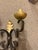 Pair of two-arm hand-wrought French wall sconces dating to the early 20th century, circa 1900. Crafted from wrought iron,...
