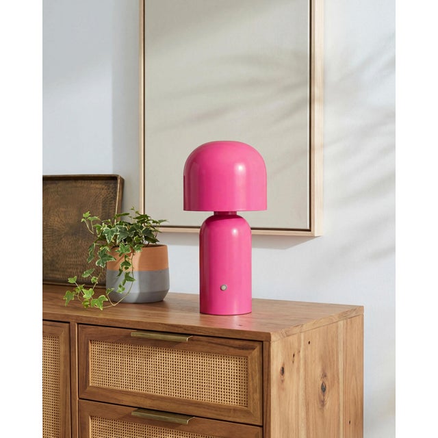 Illuminate your space with the Umbra accent table lamp, a beacon of minimalist modern style. Standing at a sleek 10 inches...