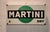 Vintage "Martini Dry" Advertising Sign - Iron and Enamel An authentic collector's item, this Martini Dry advertising sign...