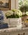 An elegant trompe l'oeil porcelain cachepot crafted in the form of a handwoven rope basket. Executed in glossy white...