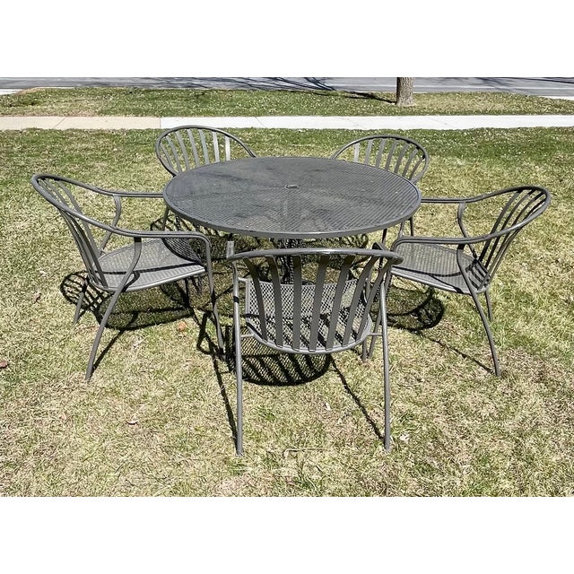 Woodard Valencia Patio Furniture set with 5 chairs and a 48" Table This set is unmarked Normal wear with some fading and...