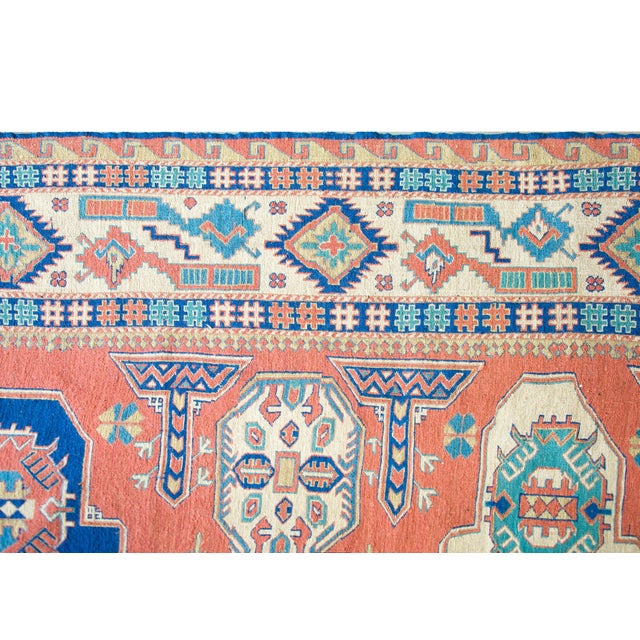 An incredible vintage mid-20th century Persian Afghani Soumak rug three large central medallions amidst a field with...
