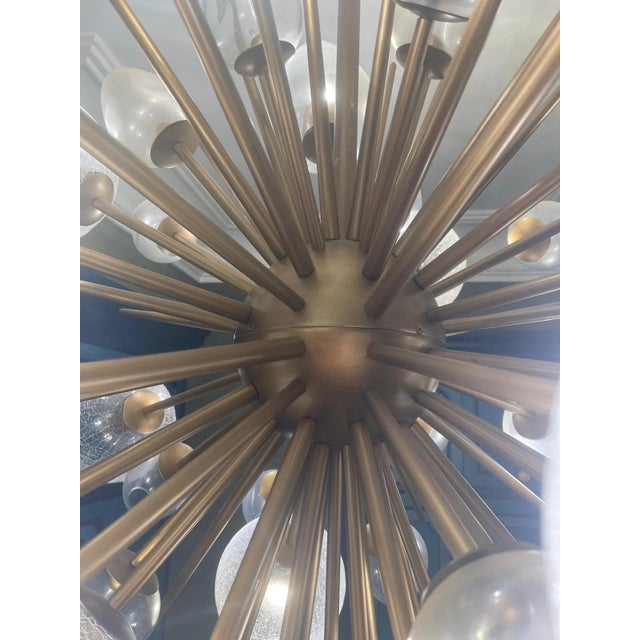 A striking custom-made chandelier by Wired Custom Lighting, based on their “Morzine” model and commissioned in 2016 in the...