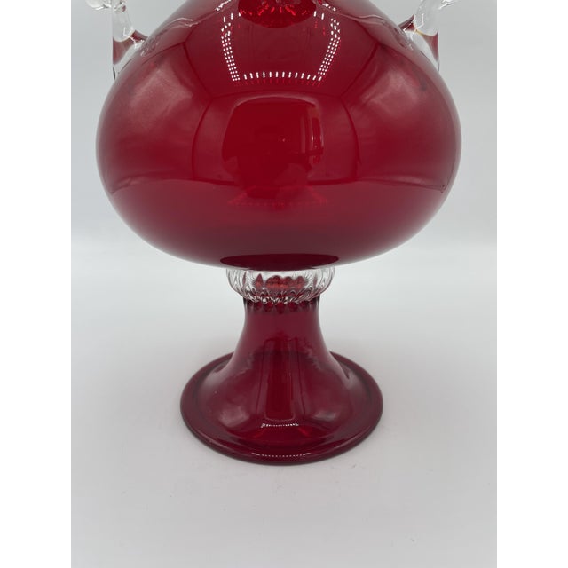 Venini vase with red handles. The design was created by Vittorio Zecchin for the renowned Venini glassworks. This vase...