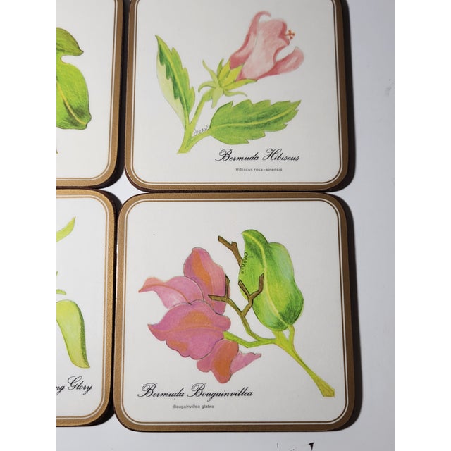 A set of six English square garden flower coasters made by Pimpernel. The coasters depict six differnt spring flowers....