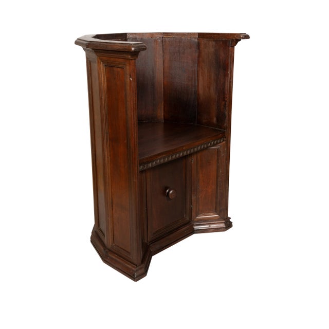 Italian Renaissance Style Walnut Monks Chair barrel form with paneled back. The seat over a door with wood knob handle.