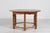 Henning Kjærnulf and Axel Einar Hjorth style round coffee table of heavy solid oak. Brutalist style with carved legs and...