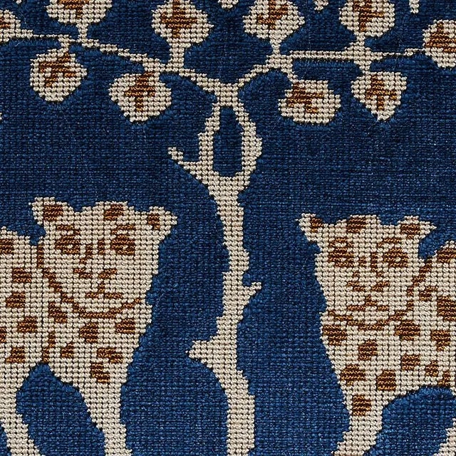 A host of historic paintings and textiles served as source material for this fabulously stylized leopard and tree motif....