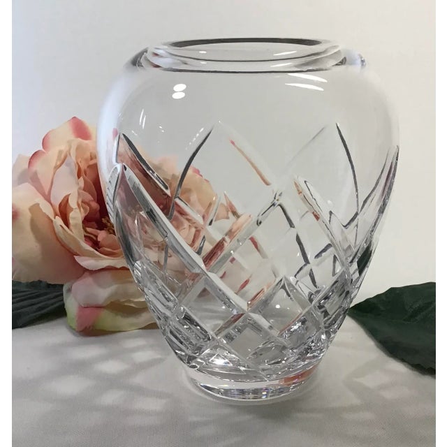 This beautiful 6” cut glass floral urn with a 2.25” opening, picks up light and reflects beauty whether empty or full of...