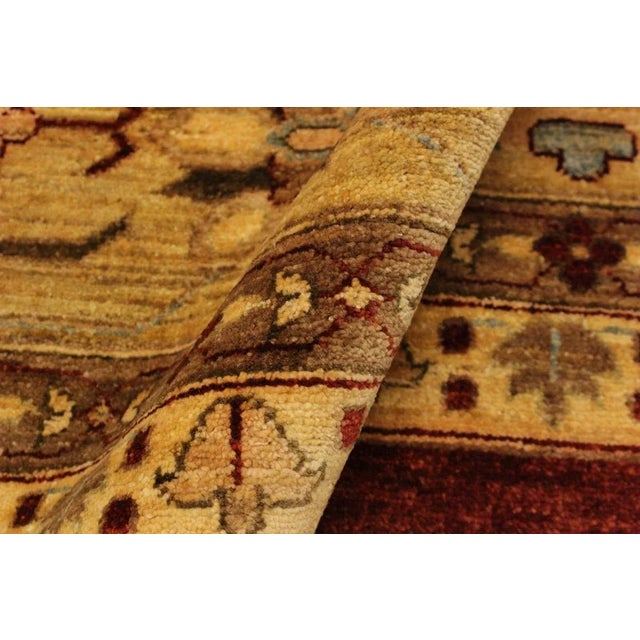 A Persian influenced Turkish hand knotted rug made by skilled artisans capable of creating the most exceptional vegetable...