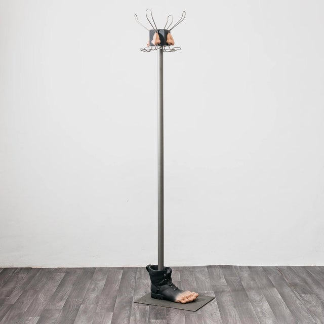 A stunning, highly collectible vintage sculptural coat rack, produced in the 1980s by renowned Italian brand Antartidee....