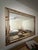 Purchased in the 60’s, this is an intricate gold tone vintage mirror in beautiful condition with a minor flaw visible in...
