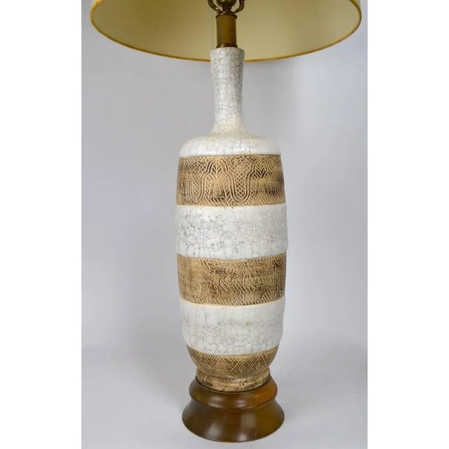 Stylish and chic Italian ceramic lamp, in the style of Ugo Zaccagnini. Free of damage, clean, and working condition, shade...