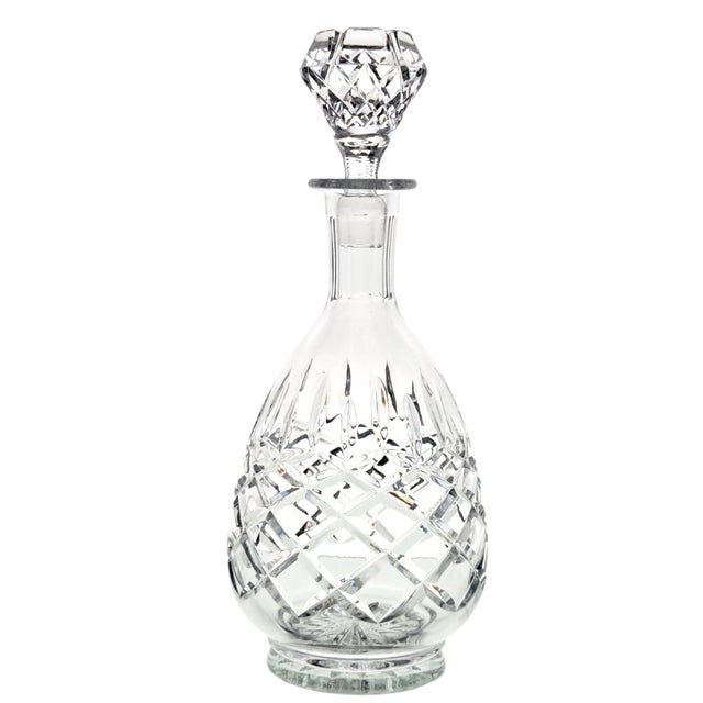An authentic Rogaska Crystal decanter in the Hamilton cut pattern, handcrafted in Yugoslavia from 24% lead crystal. The...