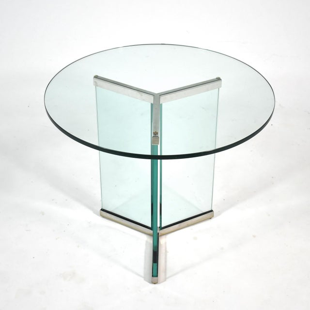 This elegant design by Leon Rosen for Pace has a base of glass, three .75" sheets held together by two chrome connectors,...