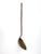 This is an antique fireplace ladle. The hand-crafted brass ladle features an iron handle with hook shaped end for hanging.