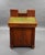 A good quality William IV mahogany davenport of large proportions, having two banks of drawers to the top, over a rising...